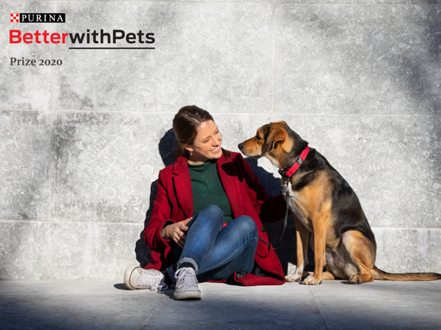 Better with pets prize woman sat with dog
