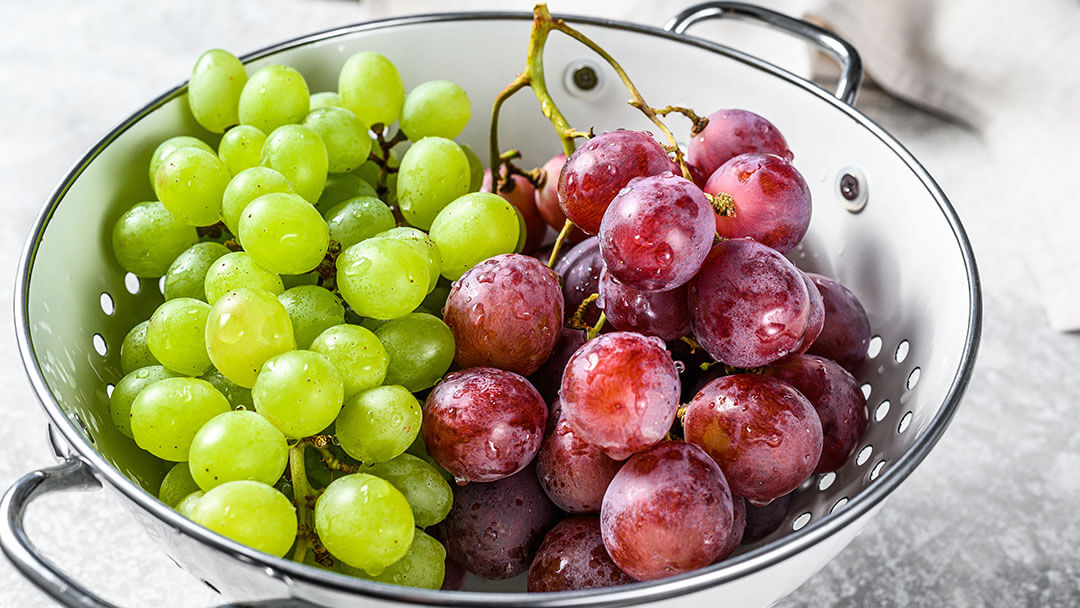 how long after eating grapes will a dog get sick