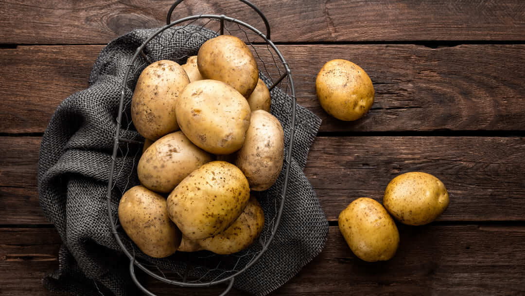 Fresh potatoes in a basket