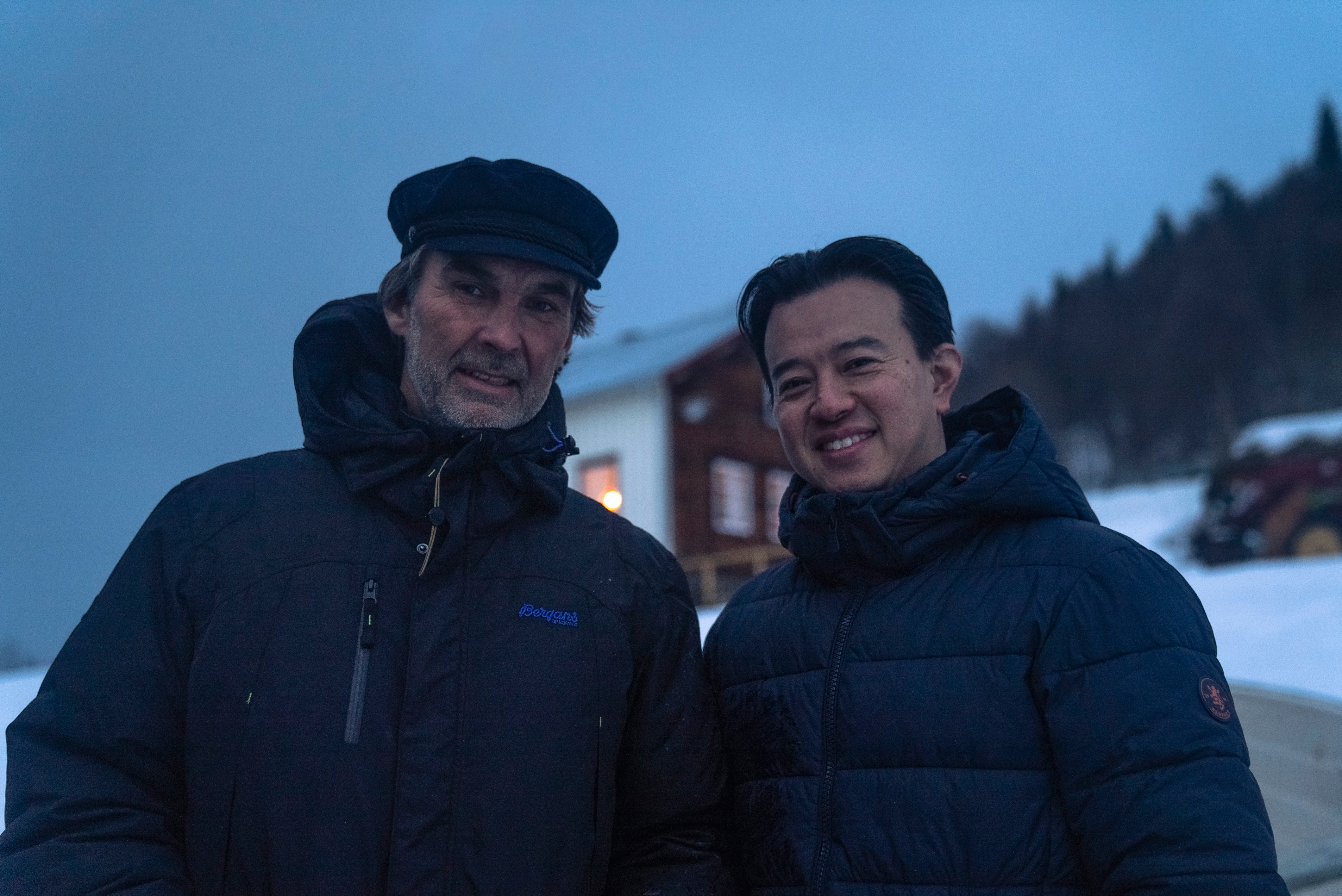 Brian from Uchinomics stands against a snowy backdrop with a friend