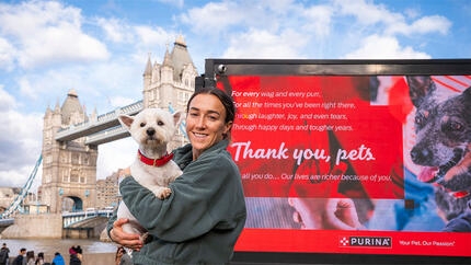 England footballer Lucy Bronze and a West Highland Terrier at Tower Bridge