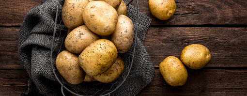 Fresh potatoes in a basket