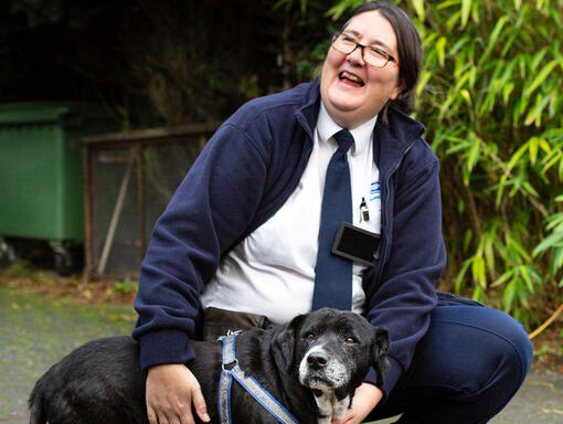 RSPCA staff member with old dog