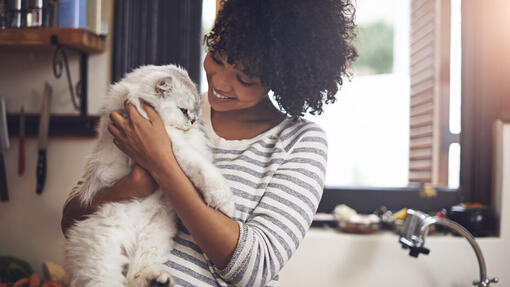 Woman holding cat