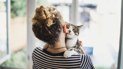 Woman holding cat